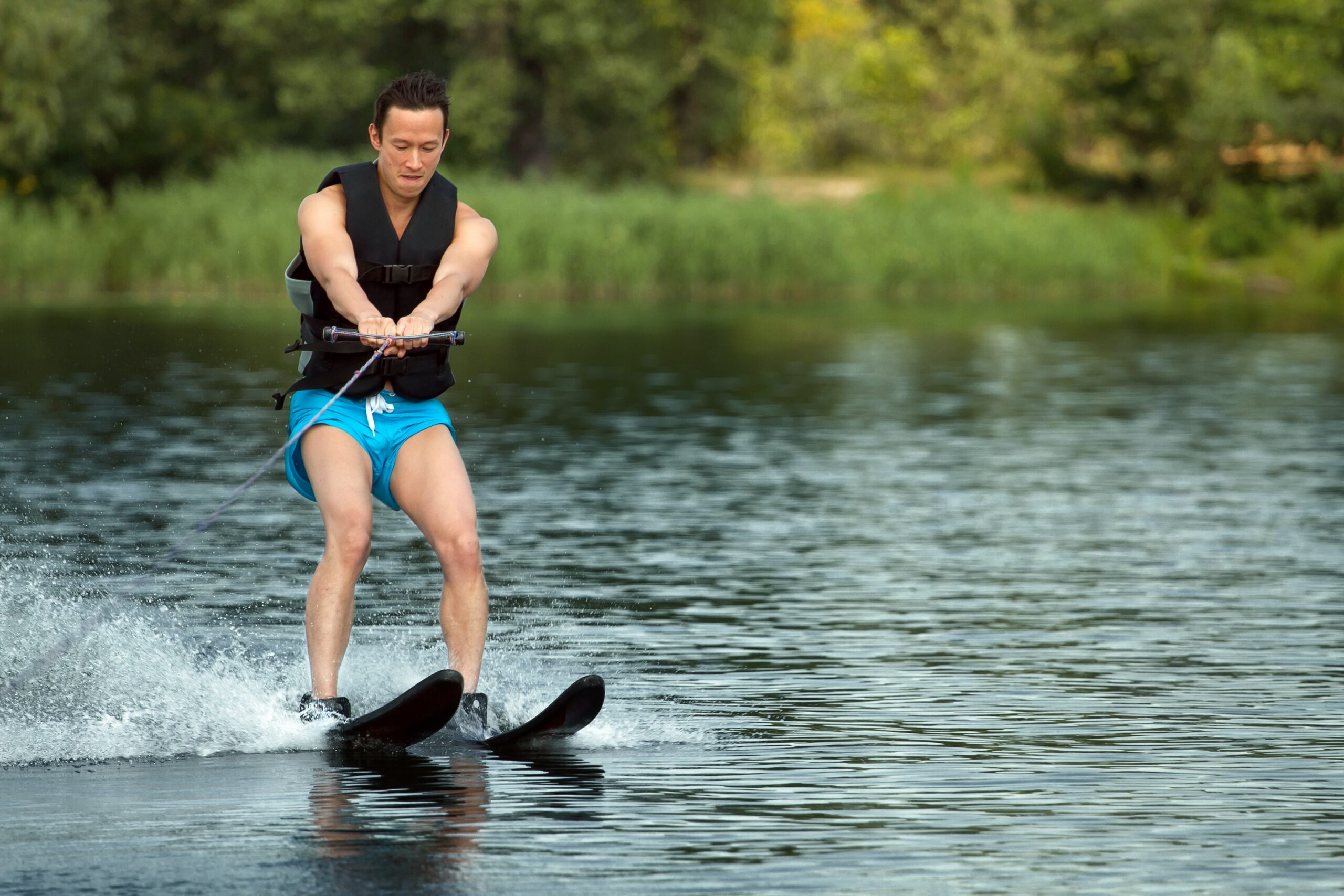 image of a man waterskiing