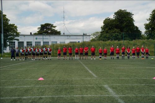 The Harlequins team and the Irish vi rugby team line out before a vi rugby game