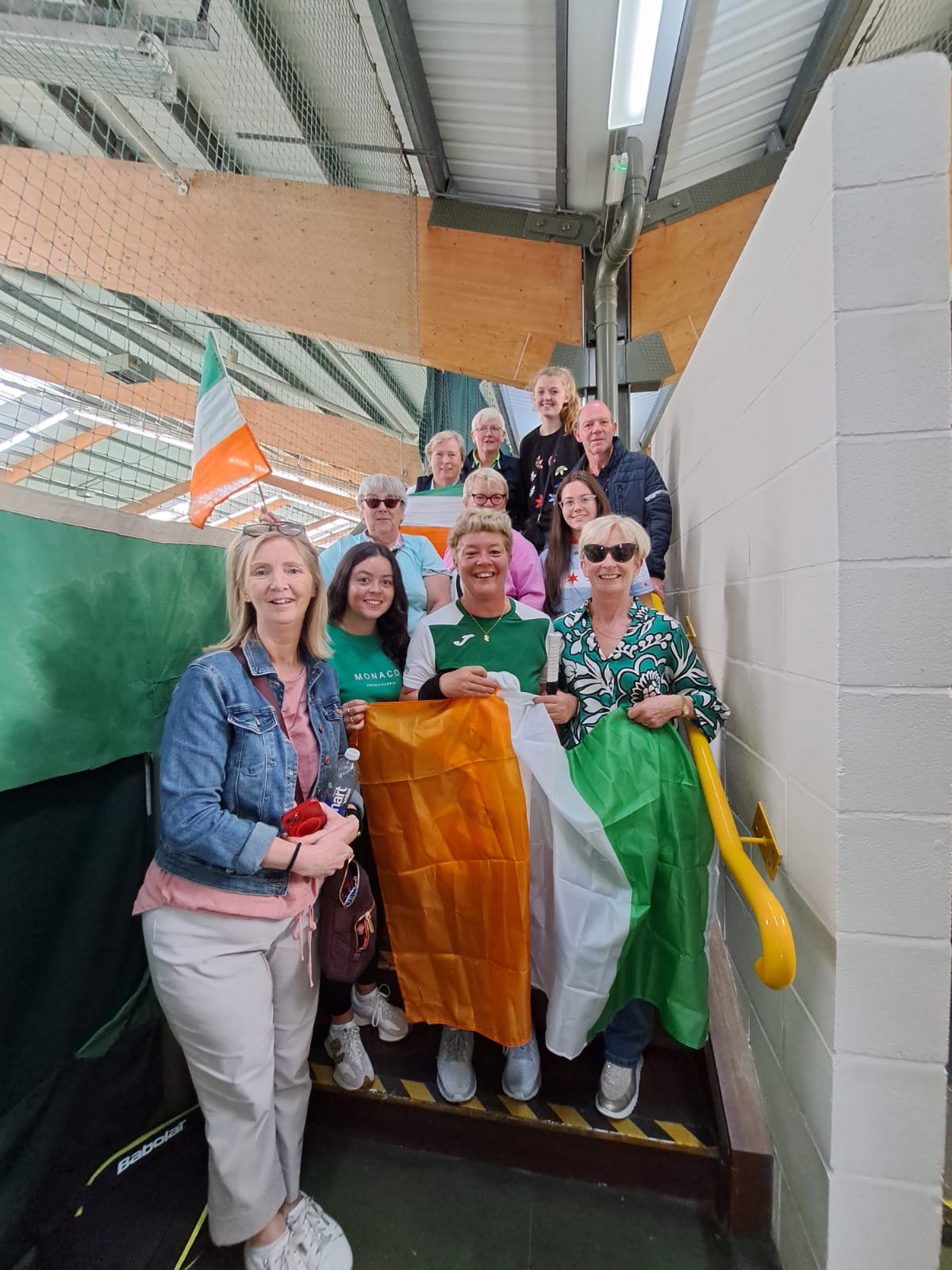 A group picture of Irish Blind/VI tennis team member Marguerite Quinn with supporters at the IBSA World Games 2023